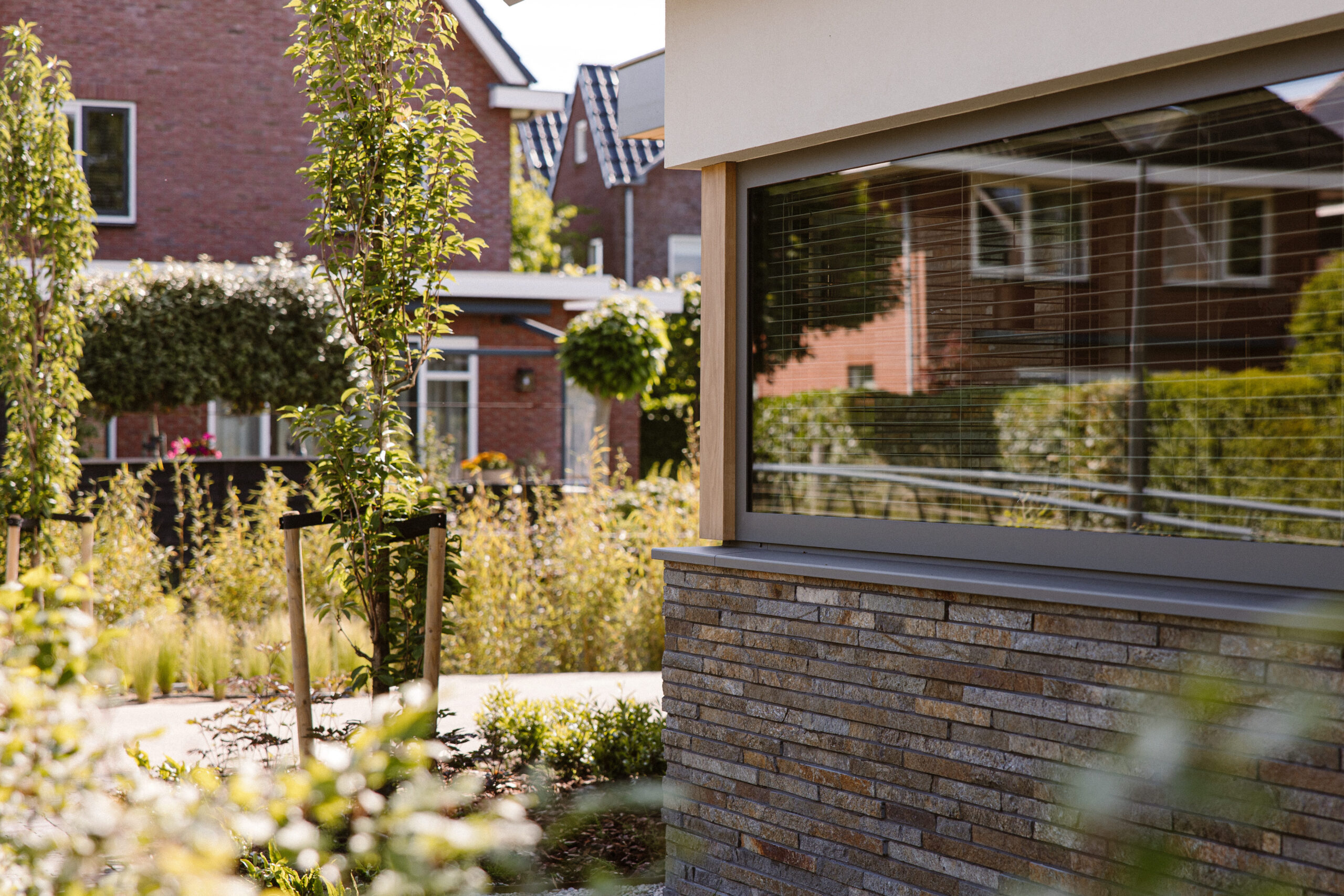 Natuursteen, natuursteenstrips, steenstrips, moderne villa, gevelbekleding, natuursteenstrips buiten, NG Bouwen met Natuursteen
